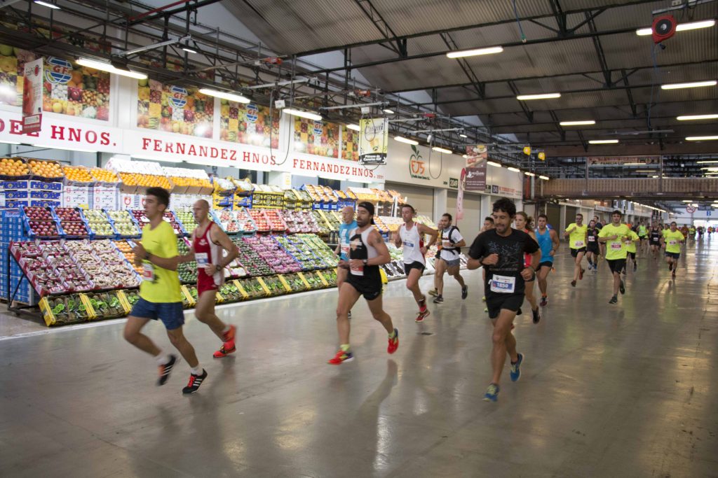 Corrent pel Mercat-Corriendo por el Mercado