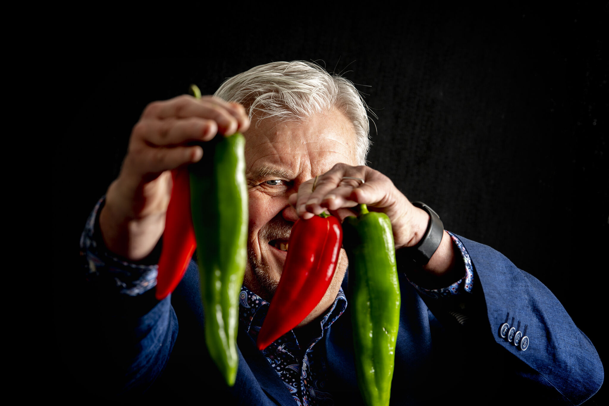 Portrait of Nicolas Jooste of the Nic Jooste Strategy and Marketing, holding peppers, working in The Netherlands. Photo credit: Nic Jooste Immersed.