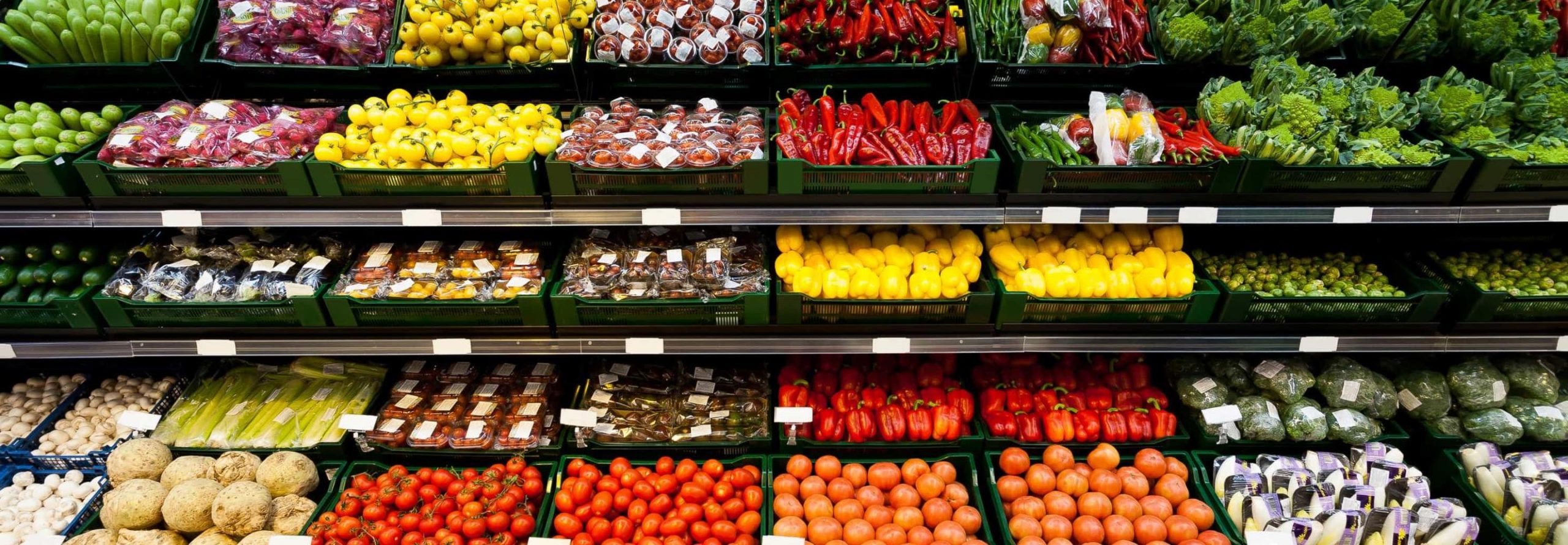 Vegetables in supermarket's shelves.