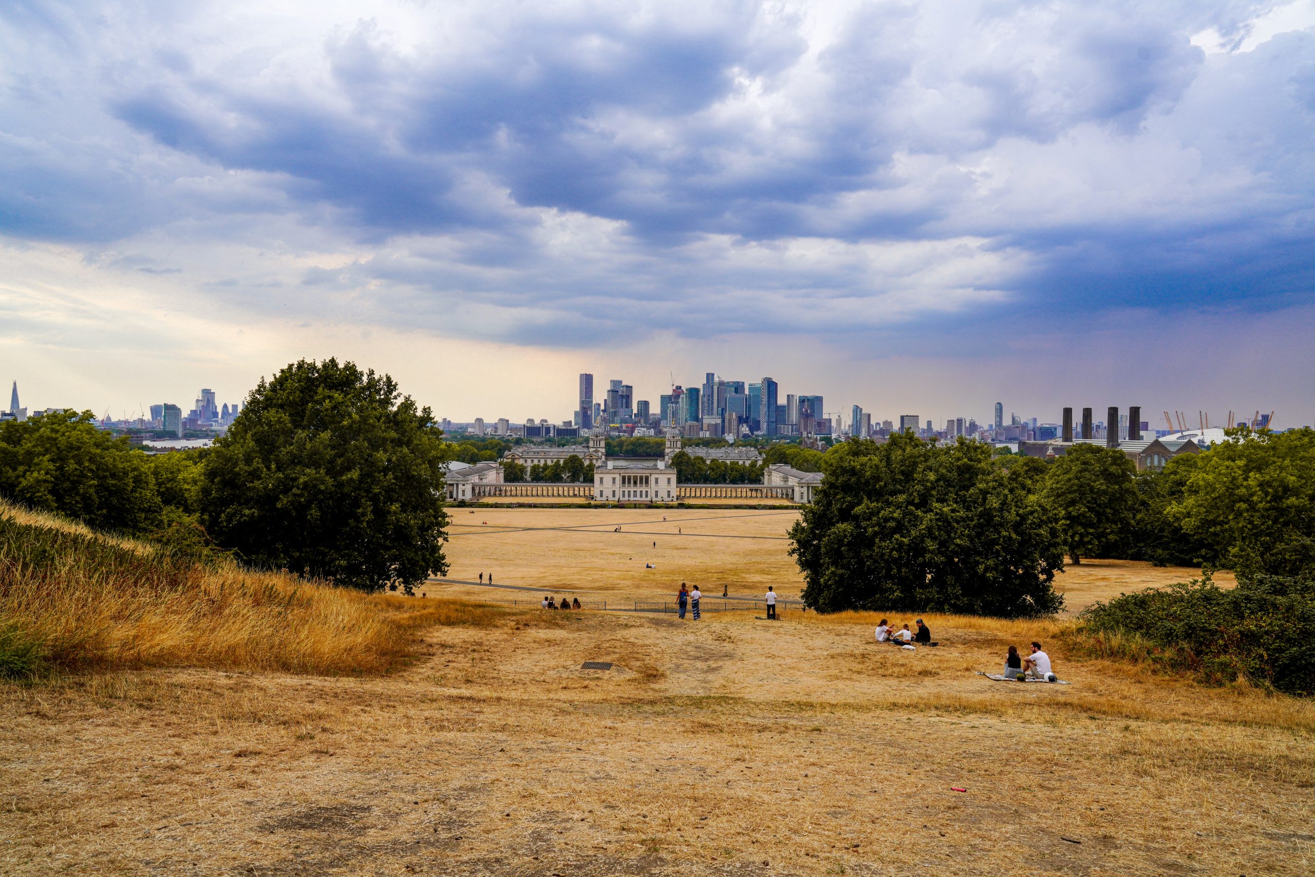 Greenwich Park - early evening of 15 August - people watch storm clouds gather over London. Copyright: Alisdare Hickson/Flickr.